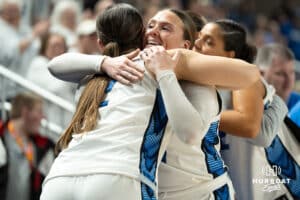 Creighton Bluejays Molly Mogensen hugs a teammate during a college basketball game against Villanova on March 2nd, 2025 in Omaha Nebraska. Photo by Brandon Tiedemann.