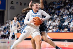 Creighton Bluejays Molly Mogensen gets past a defender during a college basketball game against Villanova on March 2nd, 2025 in Omaha Nebraska. Photo by Brandon Tiedemann.