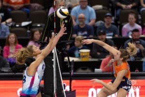Omaha Supernovas Brooke Nuneviller (5) and Omaha Supernovas Kayla Caffey (28) reach for the ball against the Indy Ignite in the third set during a professional volleyball match Sunday, March 2, 2025 in Omaha, Nebraska. Photo by John S. Peterson.