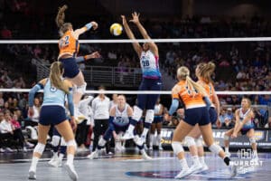 Omaha Supernovas Kayla Caffey (28) jumpss to defend against Omaha Supernovas Lindsay Krause (22) in the second set during a professional volleyball match Sunday, March 2, 2025 in Omaha, Nebraska. Photo by John S. Peterson.