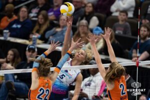 Omaha Supernovas Brooke Nuneviller (5) taps the ball over Indy Ingite Lydia Martyn (22) and Sydney Hilley (2) in the second set during a professional volleyball match Sunday, March 2, 2025 in Omaha, Nebraska. Photo by John S. Peterson.
