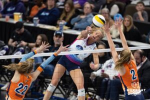 Omaha Supernovas Brooke Nuneviller (5) spikes the ball against Indy Ingite Lydia Martyn (22) and Sydney Hilley (2) in the second set during a professional volleyball match Sunday, March 2, 2025 in Omaha, Nebraska. Photo by John S. Peterson.