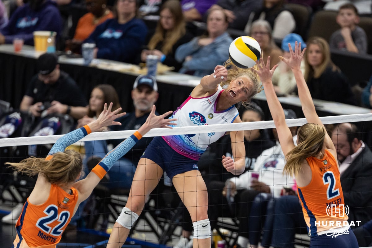 Omaha Supernovas Brooke Nuneviller (5) spikes the ball against Indy Ingite Lydia Martyn (22) and Sydney Hilley (2) in the second set during a professional volleyball match Sunday, March 2, 2025 in Omaha, Nebraska. Photo by John S. Peterson.