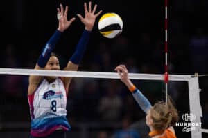 Omaha Supernovas Reagan Cooper (8) jumps to block a spike against the Indy Ignite in the first set during a professional volleyball match Sunday, March 2, 2025 in Omaha, Nebraska. Photo by John S. Peterson.