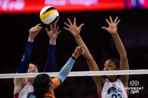 Omaha Supernovas Emily Londot (27) and Kaitlyn Hord (23) jump up to block the ball against the Indy Ignite in the first set during a professional volleyball match Sunday, March 2, 2025 in Omaha, Nebraska. Photo by John S. Peterson.