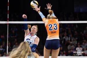 Omaha Supernovas Emily Londot (27) spikes the ball against Indy Ingite Nina Čajić (23) in the first set during a professional volleyball match Sunday, March 2, 2025 in Omaha, Nebraska. Photo by John S. Peterson.