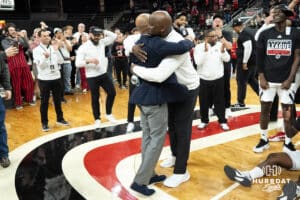Omaha Mavericks Coach Crutchfield hugs Adrian Dowell after a college basketball game against Oral Roberts on March 1st, 2025 in Omaha Nebraska. Photo by Brandon Tiedemann.
