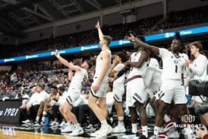 Omaha Mavericks bench celebrates during a college basketball game against Oral Roberts on March 1st, 2025 in Omaha Nebraska. Photo by Brandon