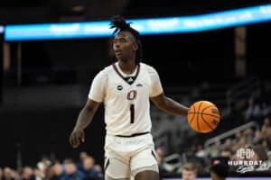 Omaha Mavericks JJ White looks to pass during a college basketball game against Oral Roberts on March 1st, 2025 in Omaha Nebraska. Photo by Brandon Tiedemann.