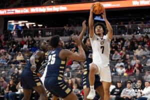 Omaha Mavericks Lance Waddles looks to shoot a lay up during a college basketball game against Oral Roberts on March 1st, 2025 in Omaha Nebraska. Photo by Brandon Tiedemann.