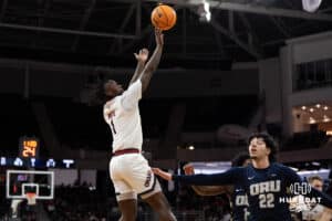Omaha Mavericks JJ White shoots a contested jumper during a college basketball game against Oral Roberts on March 1st, 2025 in Omaha Nebraska. Photo by Brandon Tiedemann.