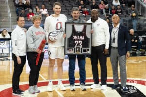 Omaha Mavericks Joshua Streit with family and coach before a college basketball game against Oral Roberts on March 1st, 2025 in Omaha Nebraska. Photo by Brandon Tiedemann.
