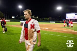 Nebraska Cornhusker outfielder Gabe Swansen (44) walks over for a post game interview after hitting in three runs in the ninth for the win over the Kansas St. Wildcats during a college baseball game Tuesday, April 29, 2025 in Lincoln, Nebraska. Photo by John S. Peterson.