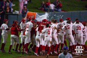 Nebraska Cornhuskers dump water on Gabe Swansen after driving three runs in for the walk-off against the Kansas St. Wildcats during a college baseball game Tuesday, April 29, 2025 in Lincoln, Nebraska. Photo by John S. Peterson.