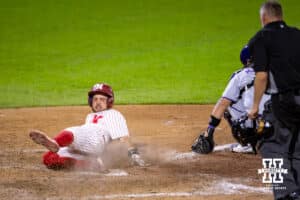 Nebraska Cornhusker outfielder Gabe Swansen (44) scores in the ninth inning for the walk-off win over the Kansas St. Wildcats during a college baseball game Tuesday, April 29, 2025 in Lincoln, Nebraska. Photo by John S. Peterson.