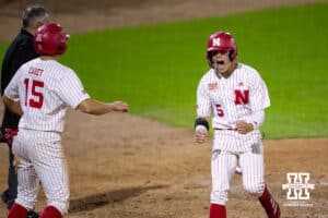 Nebraska Cornhusker outfielder Robby Bolin (5) scores in the ninth inning for the walk-off win over the Kansas St. Wildcats during a college baseball game Tuesday, April 29, 2025 in Lincoln, Nebraska. Photo by John S. Peterson.