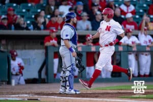 Nebraska Cornhusker infielder Tyler Stone (55) scores a run in the sixth inning against the Kansas St. Wildcats during a college baseball game Tuesday, April 29, 2025 in Lincoln, Nebraska. Photo by John S. Peterson.