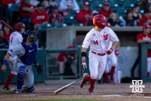 Nebraska Cornhusker utility Case Sanderson (14) hits a single driving in Buettenback and Swanson for two runs against the Kansas St. Wildcats in the sixth inning game Tuesday, April 29, 2025 in Lincoln, Nebraska. Photo by John S. Peterson.