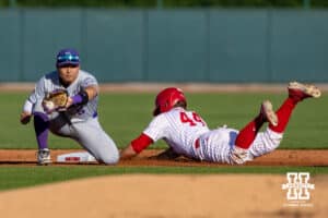 Nebraska Cornhusker outfielder Gabe Swansen (44) slides at second base against the Kansas St. Wildcats during a college baseball game Tuesday, April 29, 2025 in Lincoln, Nebraska. Photo by John S. Peterson.