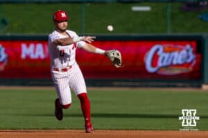 Nebraska Cornhusker utility Cayden Brumbaugh (0) throws to first for an out against the Kansas St. Wildcats during a college baseball game Tuesday, April 29, 2025 in Lincoln, Nebraska. Photo by John S. Peterson.