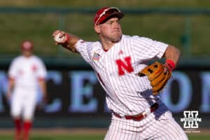 Nebraska Cornhusker infielder Josh Overbeek (4) throws to first against the Kansas St. Wildcats during a college baseball game Tuesday, April 29, 2025 in Lincoln, Nebraska. Photo by John S. Peterson.