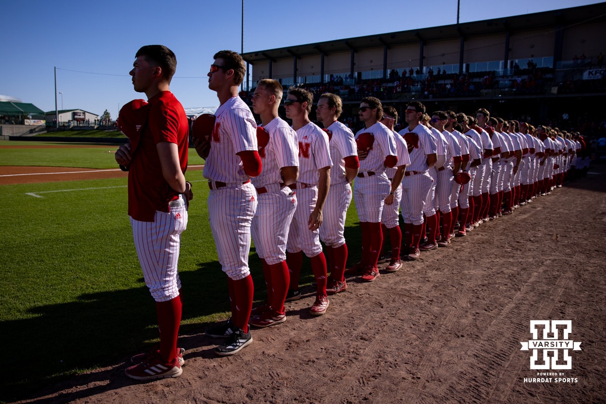 Nebraska Cornhuskers lined up for the National Anthem before taking on the Kansas St. Wildcats during a college baseball game Tuesday, April 29, 2025 in Lincoln, Nebraska. Photo by John S. Peterson.