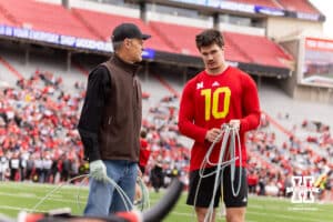 John Cook gives Heinrich Haarberg advice on roping during Husker games Saturday, April 26, 2025 in Lincoln, Nebraska. Photo by John S. Peterson.