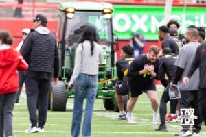 Nebraska defensive linemen Riley Van Poppel and Williams Nwaneri pull a tractor during Husker games Saturday, April 26, 2025 in Lincoln, Nebraska. Photo by John S. Peterson.