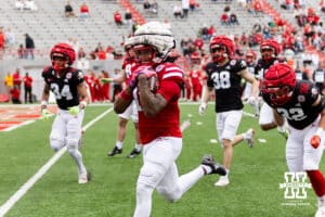 Nebraska wide receiver Jaidyn Doss (12) runs with the ball for a touchdown during Husker games Saturday, April 26, 2025 in Lincoln, Nebraska. Photo by John S. Peterson.