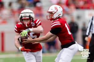 Nebraska quarteback Luke Longval (17) hands the ball off to running back Izaac Dickey (45) during Husker games Saturday, April 26, 2025 in Lincoln, Nebraska. Photo by John S. Peterson.