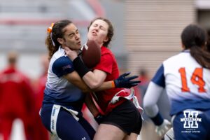 Nebraska player colides with the Midland running with the ball during Husker games Saturday, April 26, 2025 in Lincoln, Nebraska. Photo by John S. Peterson.