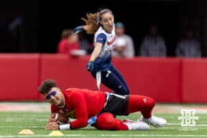 Nebraska quarterback Dylan Raiola slipped an fell against Midland during Husker games Saturday, April 26, 2025 in Lincoln, Nebraska. Photo by John S. Peterson.