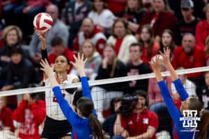 Nebraska Cornhusker Harper Murray (27) tips the ball against the Kansas Jayhawks during a college volleyball match Saturday, April 26, 2025 in Lincoln, Nebraska. Photo by John S. Peterson.