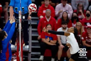 Nebraska Cornhusker Ryna Hunter (18) spikes the ball against the Kansas Jayhawks during a college volleyball match Saturday, April 26, 2025 in Lincoln, Nebraska. Photo by John S. Peterson.