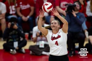 Nebraska Cornhusker Campbell Flynn (4) sets the ball against the Kansas Jayhawk during a college volleyball match Saturday, April 26, 2025 in Lincoln, Nebraska. Photo by John S. Peterson.