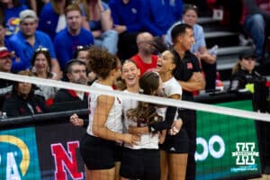 Nebraska Cornhuskers celebrate a point against the Kansas Jayhawk during a college volleyball match Saturday, April 26, 2025 in Lincoln, Nebraska. Photo by John S. Peterson.