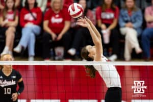 Nebraska Cornhusker Bergen Reilly (2) sets the ball against the Kansas Jayhawks during a college volleyball match Saturday, April 26, 2025 in Lincoln, Nebraska. Photo by John S. Peterson.
