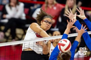 Nebraska Cornhusker Rebekah Allick (5) spikes the ball against the Kansas Jayhawks during a college volleyball match Saturday, April 26, 2025 in Lincoln, Nebraska. Photo by John S. Peterson.