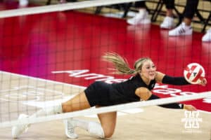 Nebraska Cornhusker Laney Choboy (6) dives for the ball against the Kansas Jayhawks during a college volleyball match Saturday, April 26, 2025 in Lincoln, Nebraska. Photo by John S. Peterson.