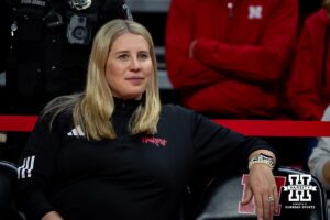 Nebraska Cornhuskers head coach Dani Busboom-Kelly watching warm-ups before during a college volleyball match Saturday, April 26, 2025 in Lincoln, Nebraska. Photo by John S. Peterson.