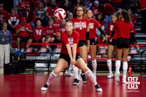Nebraska Cornhusker Campbell Flynn (4) digs the ball warming up for the Kansas Jayhawks during a college volleyball match Saturday, April 26, 2025 in Lincoln, Nebraska. Photo by John S. Peterson.