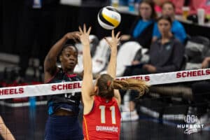 Omaha Supernovas Phoebe Awoleye (17) spikes the ball against Columbus Fury Beta Dumancic (11) during a college volleyball match Friday, April 25, 2025 in Omaha, Nebraska. Photo by John S. Peterson.
