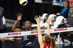 Omaha Supernovas Phoebe Awoleye (17) spikes the ball against Columbus Fury Beta Dumancic (11) during a college volleyball match Friday, April 25, 2025 in Omaha, Nebraska. Photo by John S. Peterson.
