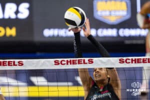 Omaha Supernovas Reagan Cooper (8) reaches to block the ball against the Columbus Fury during a professional volleyball match Friday, April 25, 2025 in Omaha, Nebraska. Photo by John S. Peterson.