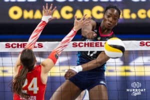 Omaha Supernovas Phoebe Awoleye (17) spike the ball against Columbus Fury Abby Walker (24) during a college volleyball match Friday, April 25, 2025 in Omaha, Nebraska. Photo by John S. Peterson.
