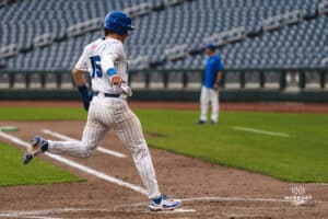 Creighton Bluejay Kyle Hess touches home plate again during a baseball game at Charles Schwab Field on Thursday, April 17th, 2025 in Omaha Nebraska. Photo by Collin Stilen.