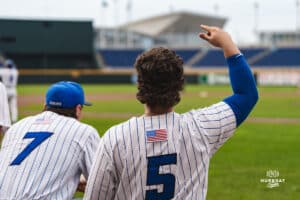 Creighton Bluejay Nate McHugh cheering on the team during a baseball game at Charles Schwab Field on Thursday, April 17th, 2025 in Omaha Nebraska. Photo by Collin Stilen.