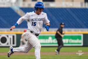 Creighton Bluejay Kyle Hess touches home plate during a baseball game at Charles Schwab Field on Thursday, April 17th, 2025 in Omaha Nebraska. Photo by Collin Stilen.