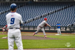 Creighton Bluejay head coach Ed Servais watches St. John pitcher during a baseball game at Charles Schwab Field on Thursday, April 17th, 2025 in Omaha Nebraska. Photo by Collin Stilen.