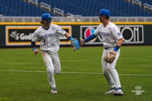 Creighton Bluejay Nolan Sailors celebrates his catch with teammate Ben North during a baseball game at Charles Schwab Field on Thursday, April 17th, 2025 in Omaha Nebraska. Photo by Collin Stilen.